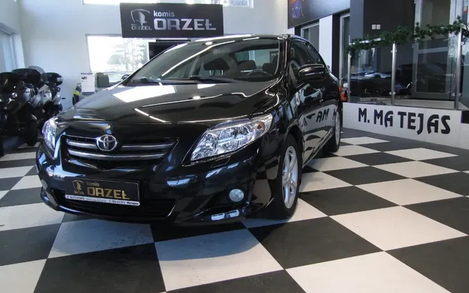 toyota łódzkie Toyota Corolla cena 23900 przebieg: 242107, rok produkcji 2009 z Kraków